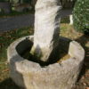 Ringbrunnen mit Säule als Quellstein