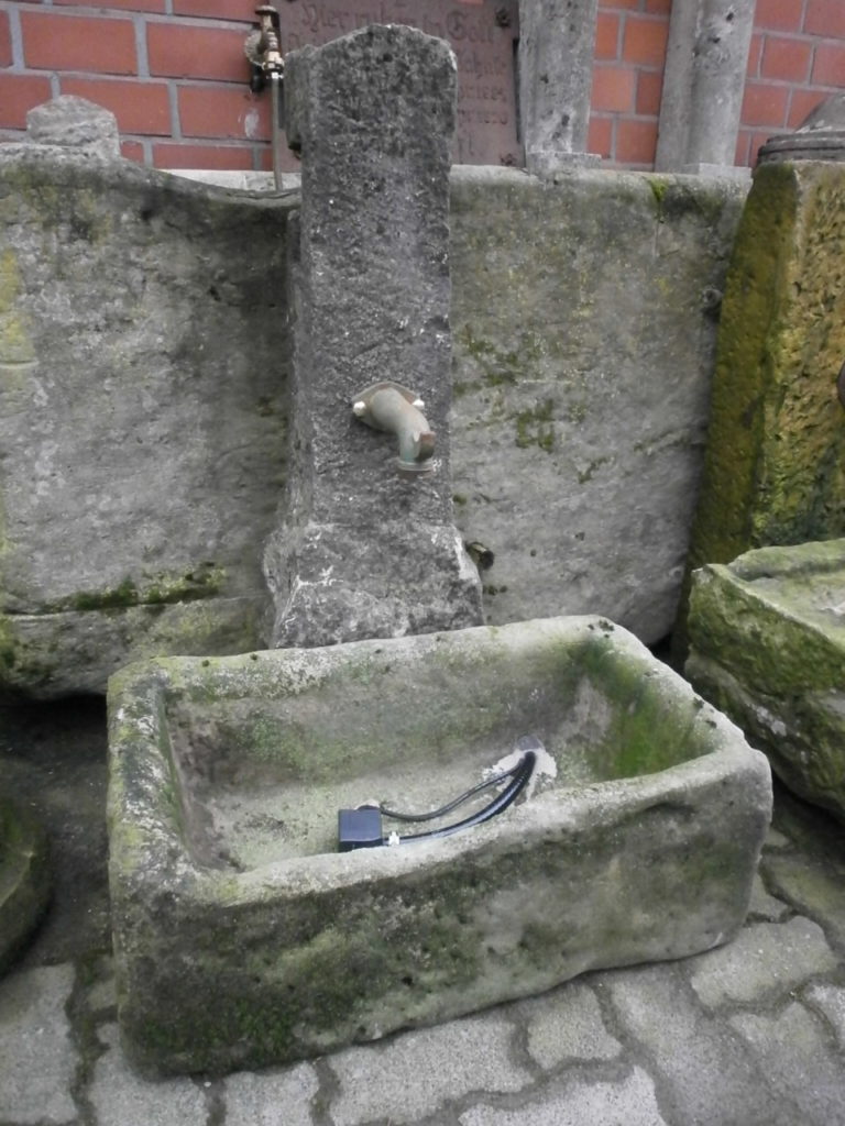 Brunnen aus alten Sandsteinen