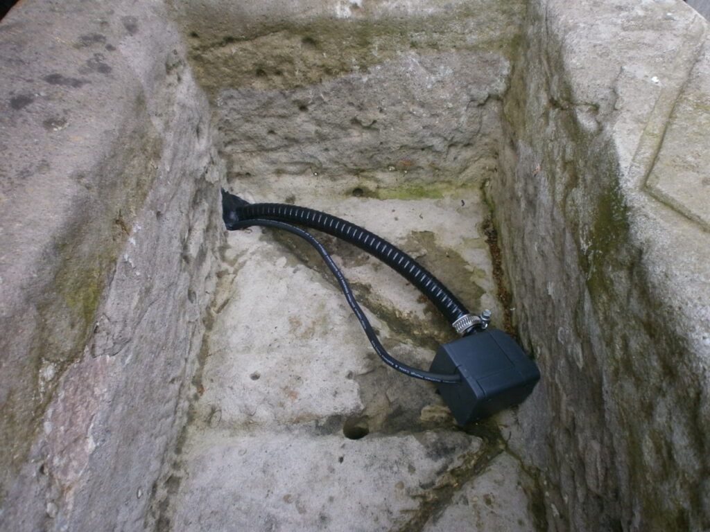 Brunnen aus alten Sandsteinen