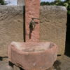 Uriger Brunnen aus Sandstein antik